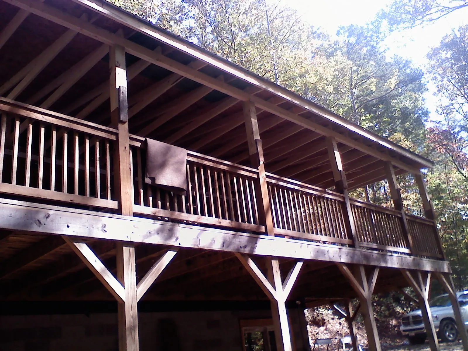 Timber framing under a new elevated porch and deck — Roof Leak Repair in Maplewood by Roofing Brothers